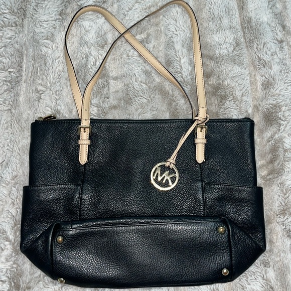 Michael Kors Handbags - Michael Kors Black and tan zippered handbag